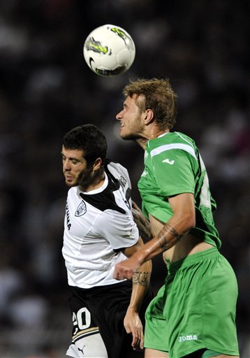 PAOK's Adelino Andre Vieirinha, Left, Challenges For The Ball With Gregor Balazic, Right, Of Karpaty Lviv Of Ukraine