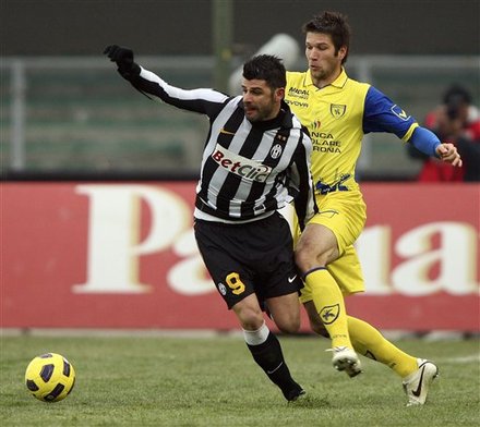 Juventus' Vincenzo Iaquinta, Left, Is