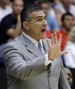 FILE - This March 19, 2011, file photo shows Kansas State head coach Frank Martin directing his team against Wisconsin during a Southeast Regional NCAA college basketball tournament game, in Tucson, Ariz. Martin says he's never been contacted by Miami about the Hurricanes' head coaching job and he has no plans to leave Kansas State. But the 2010 Big 12 coach of the year says he has been approached by several other schools in the past two years and offered significant pay increases.
