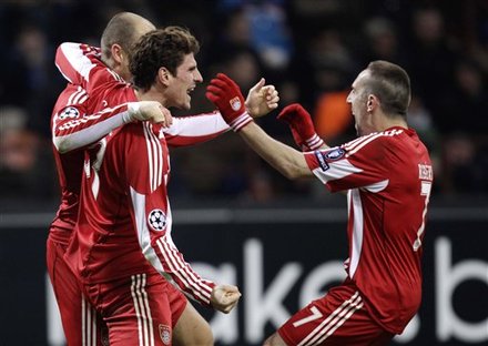 Bayern Munich Forward Mario Gomez , Center, Celebrates