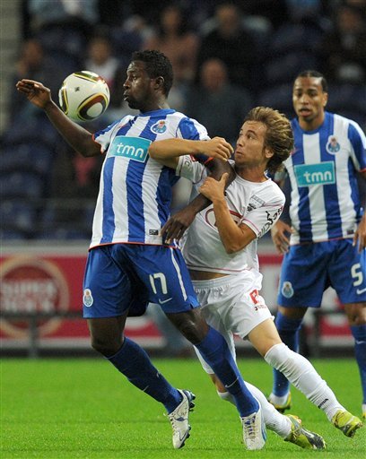 FC Porto's Silvestre Varela, Left, Challenges
