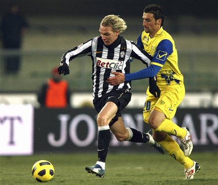 Juventus' Milos Krasic Of Serbia, Left, Is