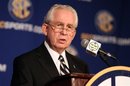 FILE - This July 21, 2010, file photo shows Southeastern Conference commissioner Mike Slive talking at a news conference during the SEC Media Days, in Hoover, Ala. An Associated Press analysis of tax records shows that four of college football's six powerhouse conferences that form the core of the BCS paid their top executives $1 million or more. In 2009, the most recent for which records are available, Big Ten commissioner Jim Delany is the highest paid at $1.6 million. He is followed by Atlantic Coast Conference commissioner John Swofford ($1.1 million), Southeastern Conference commissioner Mike Slive ($1 million) and Big 12 commissioner Dan Beebe ($997,000).