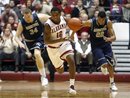 Alabama guard Trevor Releford (12) drives the ball down court as Georgetown forward Nate Lubick (34) and forward Otto Porter (22) pursue in the second half of an NCAA college basketball game in Tuscaloosa, Ala.,