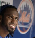 New York Mets ' Jose Reyes smiles in the dugout during the fourth inning of an intereague baseball game against the New York Yankees , Sunday, July 3, 2011, at Citi Field in New York.