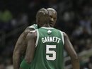 Boston Celtics center Shaquille O'Neal , right, is greeted by teammate Boston Celtics power forward Kevin Garnett after scoring in the first quarter of an NBA basketball game against the Atlanta Hawks Monday, Nov. 22, 2010 in Atlanta.