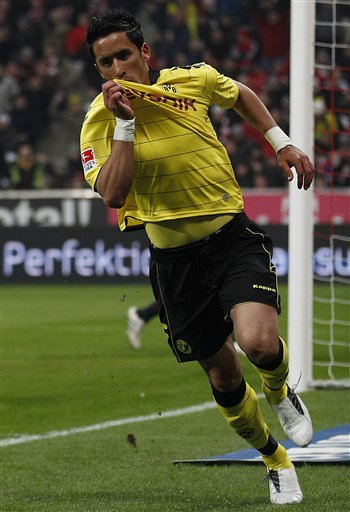 Dortmund's Lucas Barrios Of Paraguay Celebrates