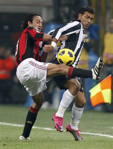 AC Milan Defender Alessandro Nesta, Left, Challenges