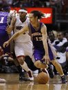 Phoenix Suns guard Steve Nash (13) drives to the basket as Miami Heat guard Eddie House , left, defends in the first quarter during an NBA basketball game in Miami on Wednesday, Nov. 17, 2010.