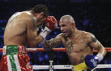 Miguel Cotto, Of Puerto Rico, Right, Punches