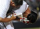Atlanta Braves ' Jordan Schafer is tended to by team personnel after being hit by a pitch during the 11th inning of a baseball game against the Pittsburgh Pirates , Tuesday, July 26, 2011, in Atlanta.