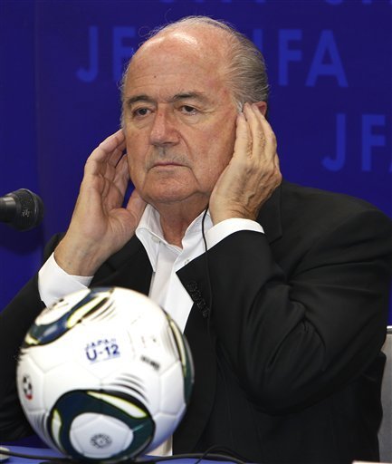 FIFA President Sepp Blatter listens to a reporter's questions during a press conference in Tokyo Monday, May 23, 2011. Blatter says it's safe to hold the Club World Cup soccer tournament in Japan as scheduled from Dec. 8-18 despite concerns about high radiation levels following the March 11 earthquake and tsunami.