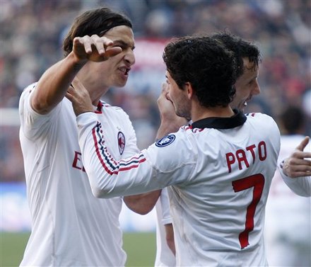 AC Milan Brazilian Forward Pato, Center, Celebrates With His Teammates Zlatan Ibrahimovic, Left, Of Sweden, And Mark