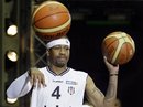 Former NBA player Allen Iverson , wearing his new team Besiktas' jersey, plays with a ball during a welcome ceremony in Istanbul, Turkey, Tuesday, Nov. 9, 2010. Iverson signed a two-year $4 million contract to play for the Turkish basketball team Besiktas.