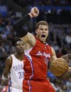 FILE - In this April 6, 2011, file photo, Los Angeles Clippers forward Blake Griffin , right, reacts following a dunk against the Oklahoma City Thunder in the first quarter of an NBA basketball game in Oklahoma City. Thunder forward Kevin Durant is at left. Griffin is expected to be named the NBA's Rookie of the Year on Wednesday, May 4, at the Los Angeles Clippers' training complex. The Clippers on Tuesday announced a news conference for the presentation of a major NBA award. Rookie of the Year is the only award left.