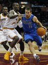 Dallas Mavericks ' Jose Barea, right, drives past Cleveland Cavaliers ' J.J. Hickson in the third quarter of an NBA basketball game Sunday, Jan. 2, 2011, in Cleveland. The Mavericks won 104-95.