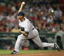 New York Yankees ' Mariano Rivera pitches in the ninth inning of a baseball game against the Boston Red Sox in Boston, Sunday, Aug. 7, 2011.