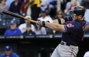 Cleveland Indians ' Travis Hafner hits a three-run double during the first inning of a baseball game against the Kansas City Royals in Kansas City, Mo., Tuesday, May 17, 2011.
