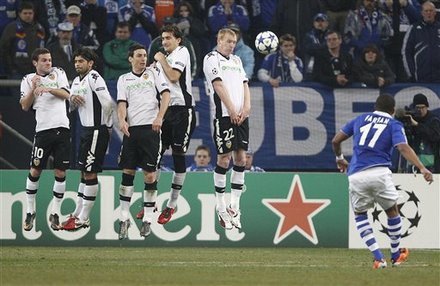 Schalke's Jefferson Farfan Of Peru, Right, Scores