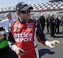 FILE - This Feb. 13, 2011, file photo shows NASCAR driver Tony Stewart gesturing after his qualifying run for the Daytona 500 auto race, at Daytona International Speedway in Daytona Beach, Fla. Stewart turns 40 on Friday, May 20, 2011, and while the two-time NASCAR champion believes age is just a number, he's clearly made huge strides in maturation over the past few years.