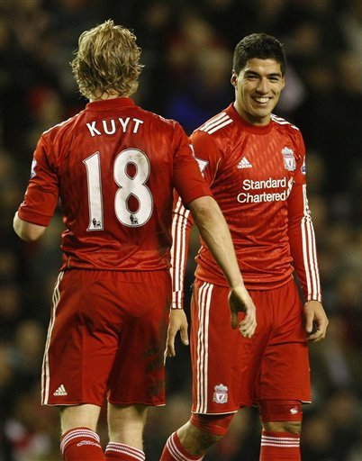 Liverpool's Luis Suarez, Right, Talks