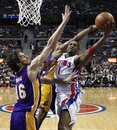 Detroit Pistons guard Tracy McGrady (1) drives on Los Angeles Lakers center Pau Gasol (16) in the first half of an NBA basketball game in Auburn Hills, Mich., Wednesday, Nov. 17, 2010.