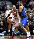 Chicago Bulls ' Taj Gibson , left, works against Dallas Mavericks ' Tyson Chandler during the first quarter of the Bulls' 82-77 win in an NBA basketball game in Chicago on Thursday Jan. 20, 2011.