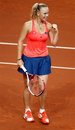 Denmarks Caroline Wozniacki reacts after beating Germany's Andrea Petkovic during their quarter final match at the Porsche Grand Prix in Stuttgart, Germany, on Thursday, April 21, 2011. Wozniacki won the match with 6-4 and 6-1.