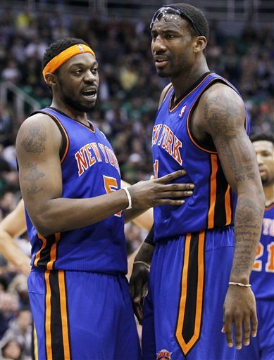 New York Knicks Guard Bill Walker (5) Consoles Knicks Forward Amar'e Stoudemire (1) As He Reacts To Getting Fouled By