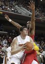 Southern California forward Nikola Vucevic, left, of Montenegro, looks to shoot as he is defended by Arizona forward Derrick Williams during the second half of an NCAA college basketball game in Los Angeles, Thursday, Feb. 24, 2011. USC won 65-57.