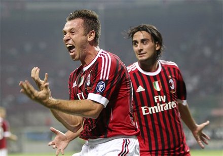 AC Milan Forward Antonio Cassano, Left, Celebrates