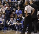 Dallas Mavericks team owner Mark Cuban, left, shouts in the direction of referee Dan Crawford (43), right, late in the second half of an NBA basketball game against the Portland Trail Blazers  Tuesday, April 19, 2011, in Dallas. The Mavericks won 101-89.
