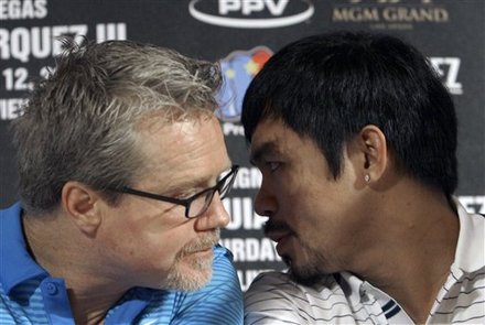 Manny Pacquiao, Of The Philippines, Right, And His