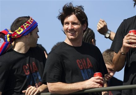 FC Barcelona's Lionel Messi, Center, From Argentina, Celebrates