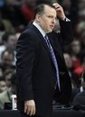 Chicago Bulls head coach Tom Thibodeau reacts as he watches his team play against the Houston Rockets during the first quarter of an NBA basketball game, Saturday, Dec. 4, 2010, in Chicago.