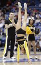 A Virginia Commonwealth cheerleader walks the length of the court on her hands during VCU's 59-46 win over Southern California in a first-round NCAA college basketball tournament game, Wednesday, March 16, 2011, in Dayton, Ohio . (AP Photo)