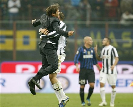 Juventus Coach Antonio Conte, Left, Celebrates