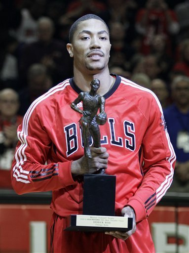 Chicago Bulls' Derrick Rose Holds The Maurice Podoloff Trophy As The Winner Of 2010-11 Kia NBA's Most Valuable Player