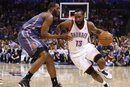 Oklahoma City Thunder guard James Harden , right, drives to the basket as Charlotte Bobcats forward D.J. White , left, defends during the fourth quarter of an NBA basketball game in Oklahoma City, Friday, March 18, 2011.  Oklahoma City defeated Charlotte 99-82.