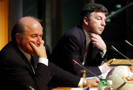  FIFA President Joseph Blatter, Left,  And Then Secretary General Michel Zen-Ruffinen Attending A Press Conference In