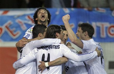 Real Madrid's Marcelo From Brazil, Top Left, Celebrates