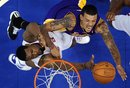 Los Angeles Lakers small forward Matt Barnes , right, Los Angeles Clippers center DeAndre Jordan defends during the second half of their NBA basketball game, Wednesday, Dec. 8, 2010, in Los Angeles. The Lakers won 87-86.