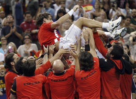 Spain's Team Celebrates By Tossing David Ferrer, Who Defeated Mardy Fish Of The United States, 7-5, 7-6 (3), 5-7, 7-6 (