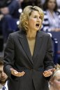 Rhode Island head coach Cathy Inglese reacts in the second half of an NCAA college basketball game against Xavier , Saturday, Jan. 29, 2011, in Cincinnati. Xavier won 67-45.