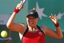 Vera Zvonareva of Russia serves in her match against Sabine Lisicki of Germany during the second round match of the French Open tennis tournament at Roland Garros stadium in Paris, Wednesday May 25, 2011.