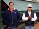 BALTIMORE, MD - MAY 19: Dale Romans (L) trainer of Preakness entrant Shackleford and Bob Baffert (R) trainer of Preakness entrant Midnight Interlude, talk outside the stakes barn at Pimlico Rac Course on May 19, 2011 in Baltimore, Maryland. The 136th running of the Preakness Stakes will be run on Saturday. (Photo by Rob Carr/Getty Images)