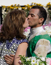 BALTIMORE, MD - MAY 20: Jockey Jose Lezcano kisses Karen Woods in the winners circle after riding Royal Delta to win the Black-Eyed Susan Stakes at Pimlico Race Course on May 20, 2011 in Baltimore, Maryland. (Photo by Rob Carr/Getty Images)