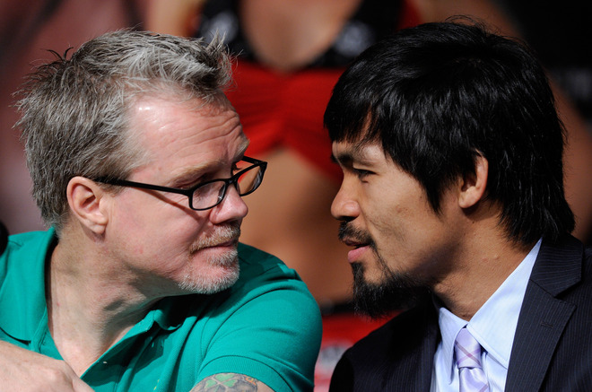 LAS VEGAS, NV - MAY 04:  Trainer Freddie Roach (L) talks with boxer Manny Pacquiao during the final news conference for Pacquiao's bout against Shane Mosley at the MGM Grand Hotel/Casino May 4, 2011 in Las Vegas, Nevada. Pacquiao will defend his WBO welterweight title against Mosley on May 7, 2011 in Las Vegas.  (Photo by Ethan Miller/Getty Images)