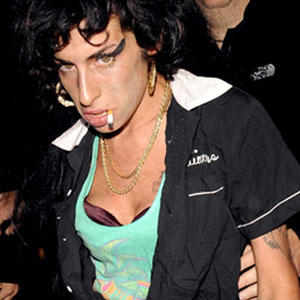 Winehouse Hubby Plots Divorce, Blames Adultery <br />    (E! Online)