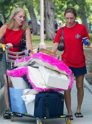 **FILE PHOTO** Cathy Worley left assists her daughter Christy 18 as she moves into a dormitory at the University of Texas Aug. 20 2004 in Austin Texas. Christy a freshman said she does not expect to gain weight despite a trend among students to put on 15 pounds freshman year. (AP Photo/Harry Cabluck)